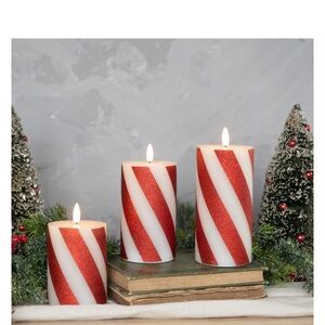 Ragon House - set of 4 candy cane 3D candals 
New in box